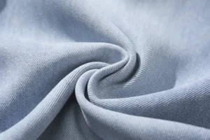 Nylon fabric texture showing smooth polyamide fibers used in modern apparel manufacturing